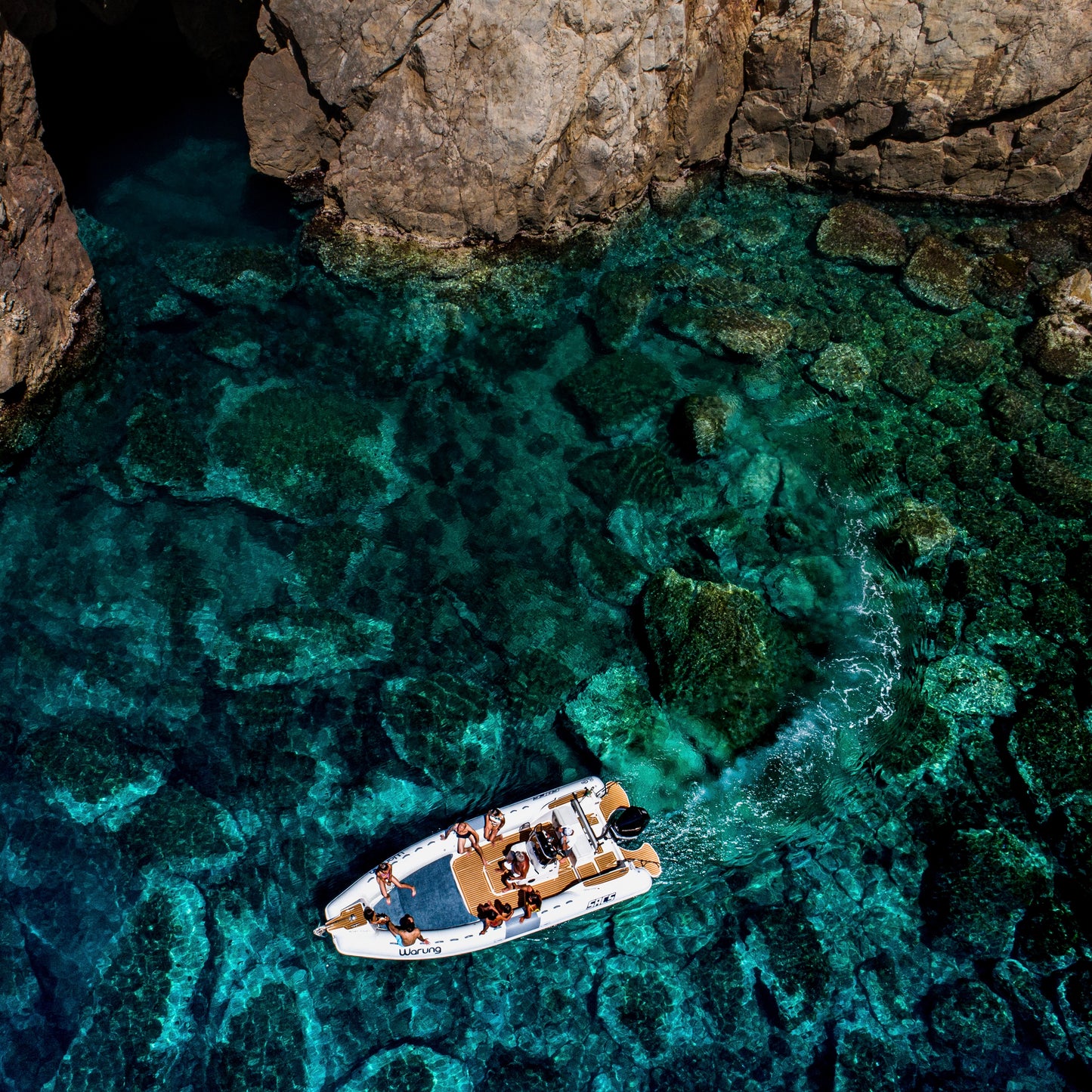 Visita di Porto Flavia e Tour in Gommone con Maria